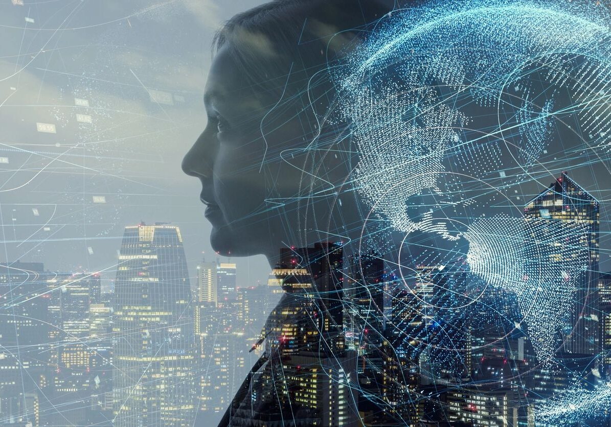 Silhouette with digital globe over cityscape.
