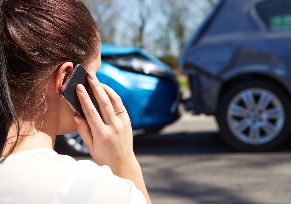 Woman calling after a car accident.